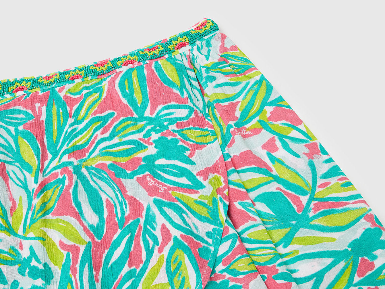 Benetton_Mini Skirt with Tropical Print_4UIAC002E_73J_03