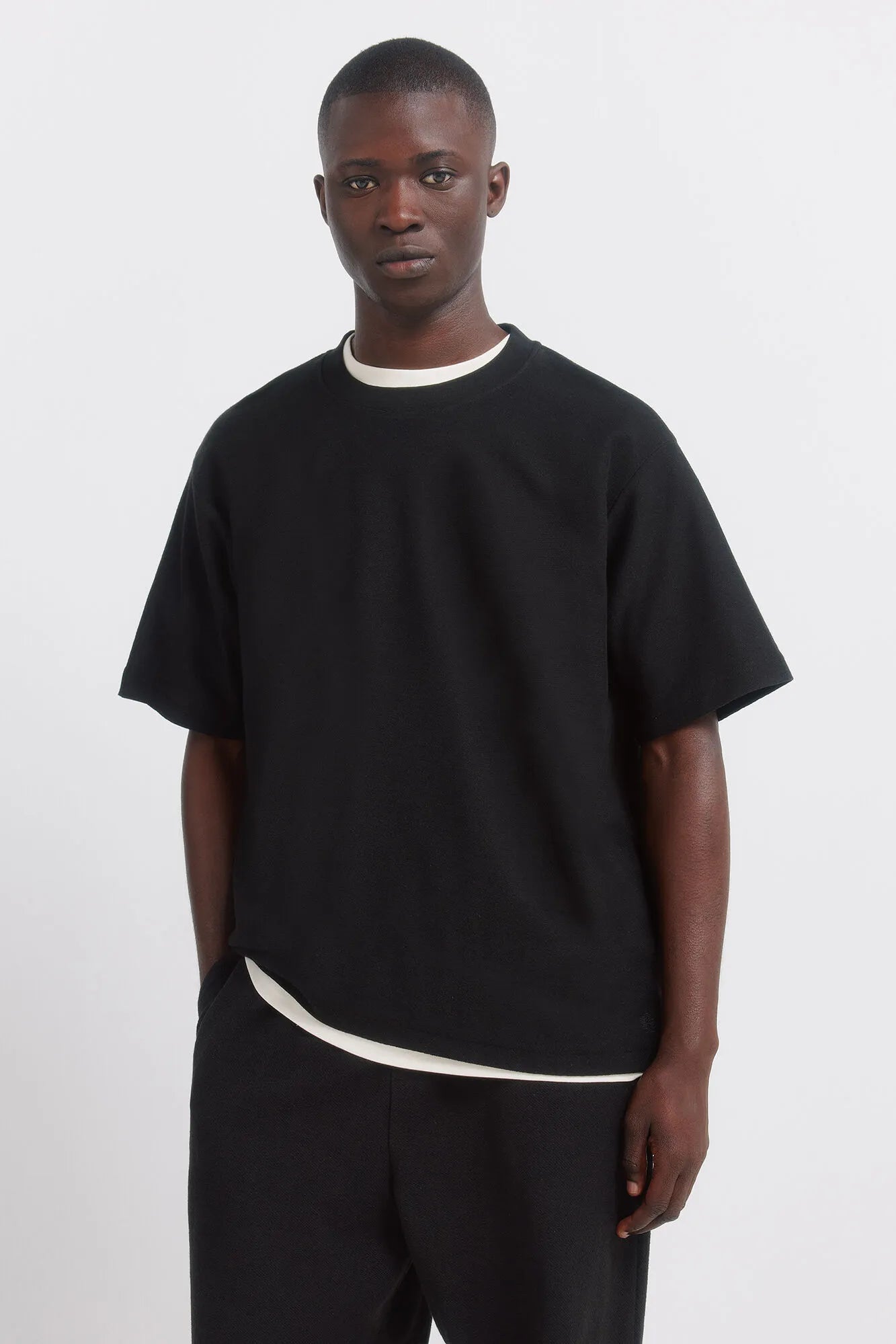 Springfield Black Men Textured T-Shirt SKU: 3283430_01 Image 01