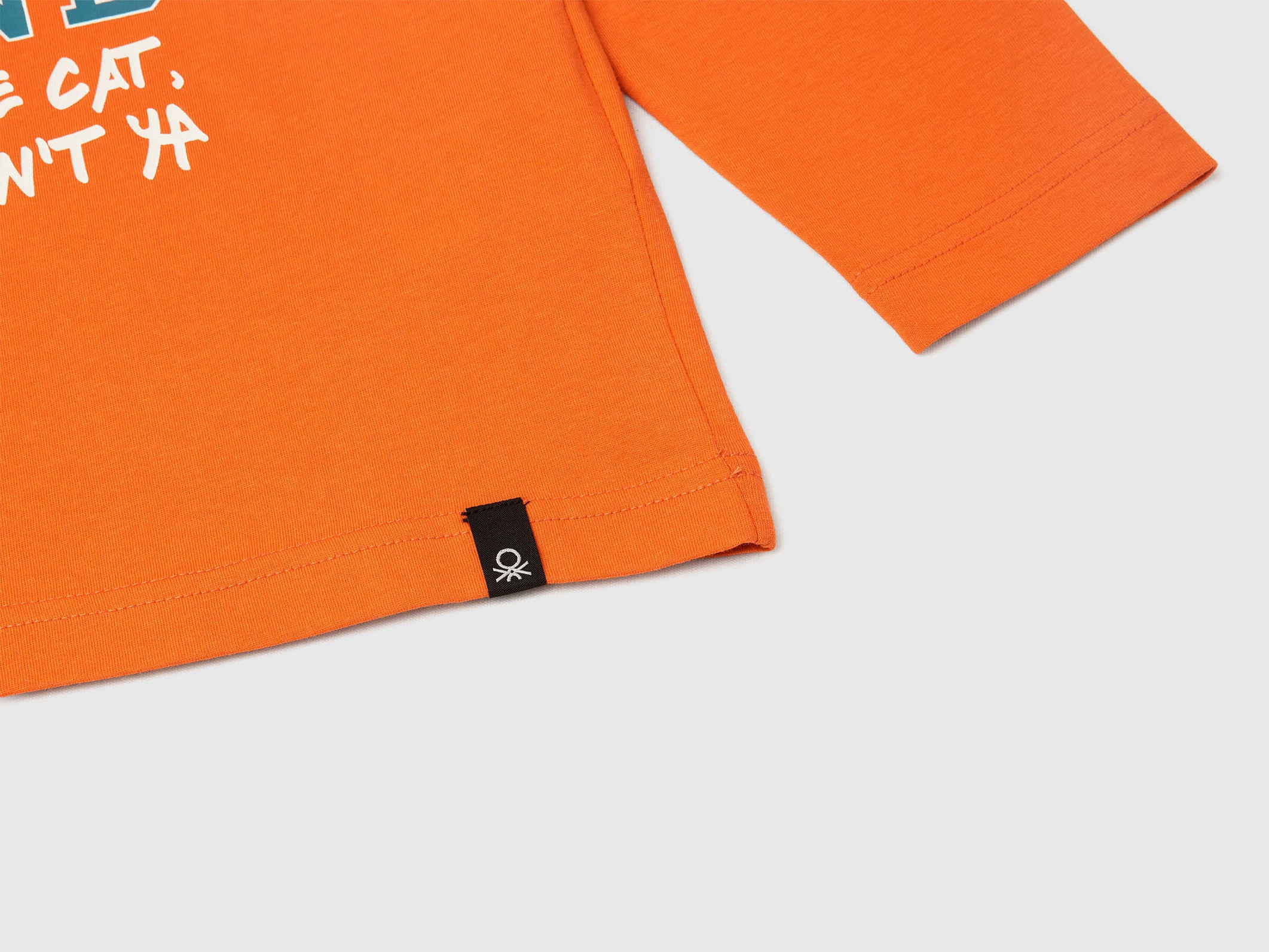 Benetton_Orange_T-Shirt Featuring Garfield ©2025 By Paws, Inc._35RYC10QA_04J_03