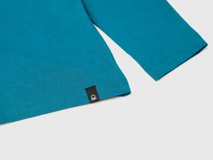 Benetton_Teal_T-Shirt Featuring Garfield ©2025 By Paws, Inc._35RYC10QA_3C5_03