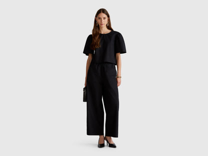 Benetton_Lightweight Trousers with Wide Leg_4AC7DF09A_100_01