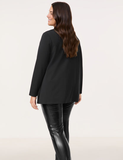 Flared Long Sleeve Top With A Decorative Detail_06