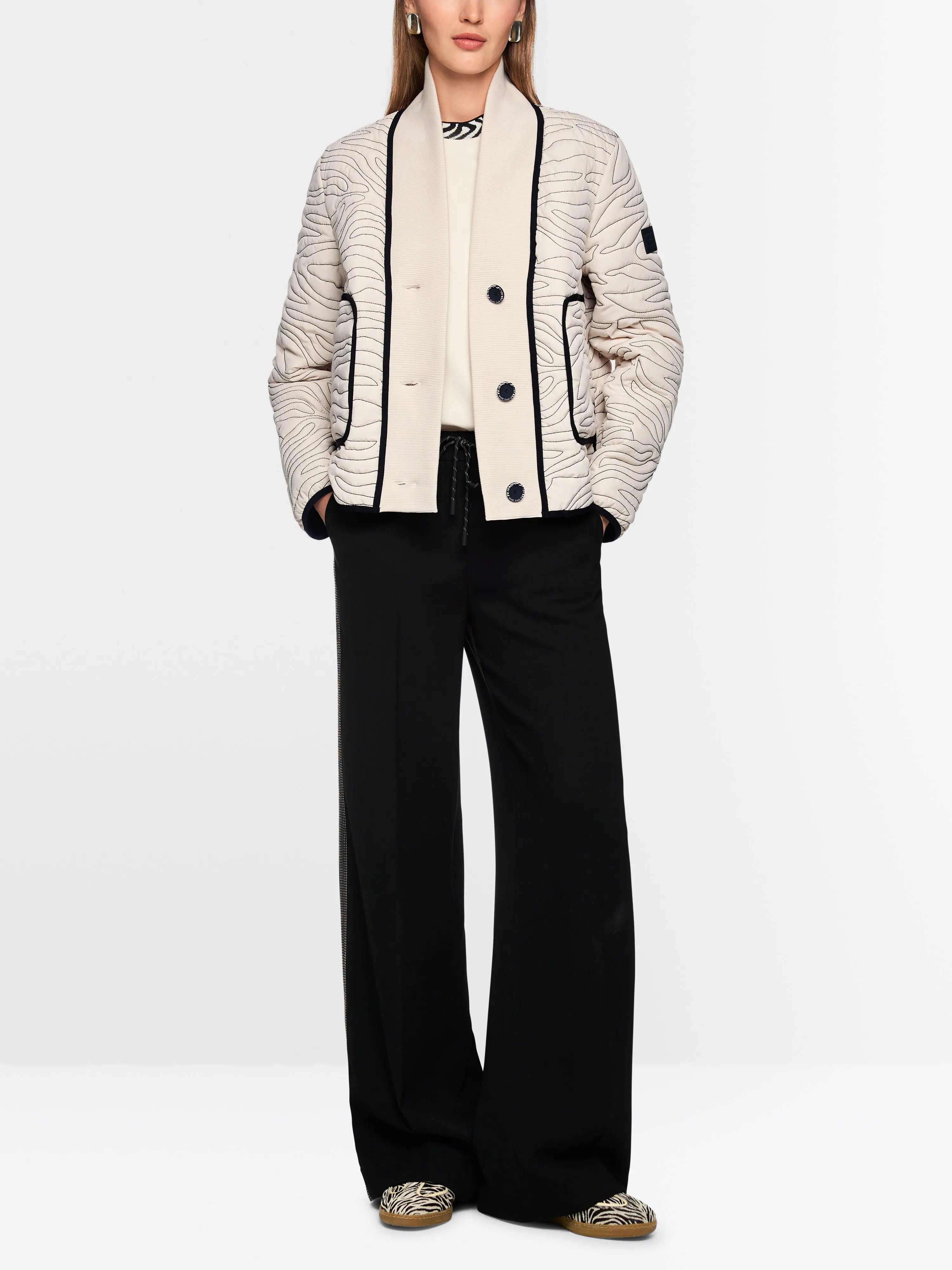 Marc Cain_Magnolia_Short Quilted Jacket with Knit Detail_AS 12.03 W18_153_01