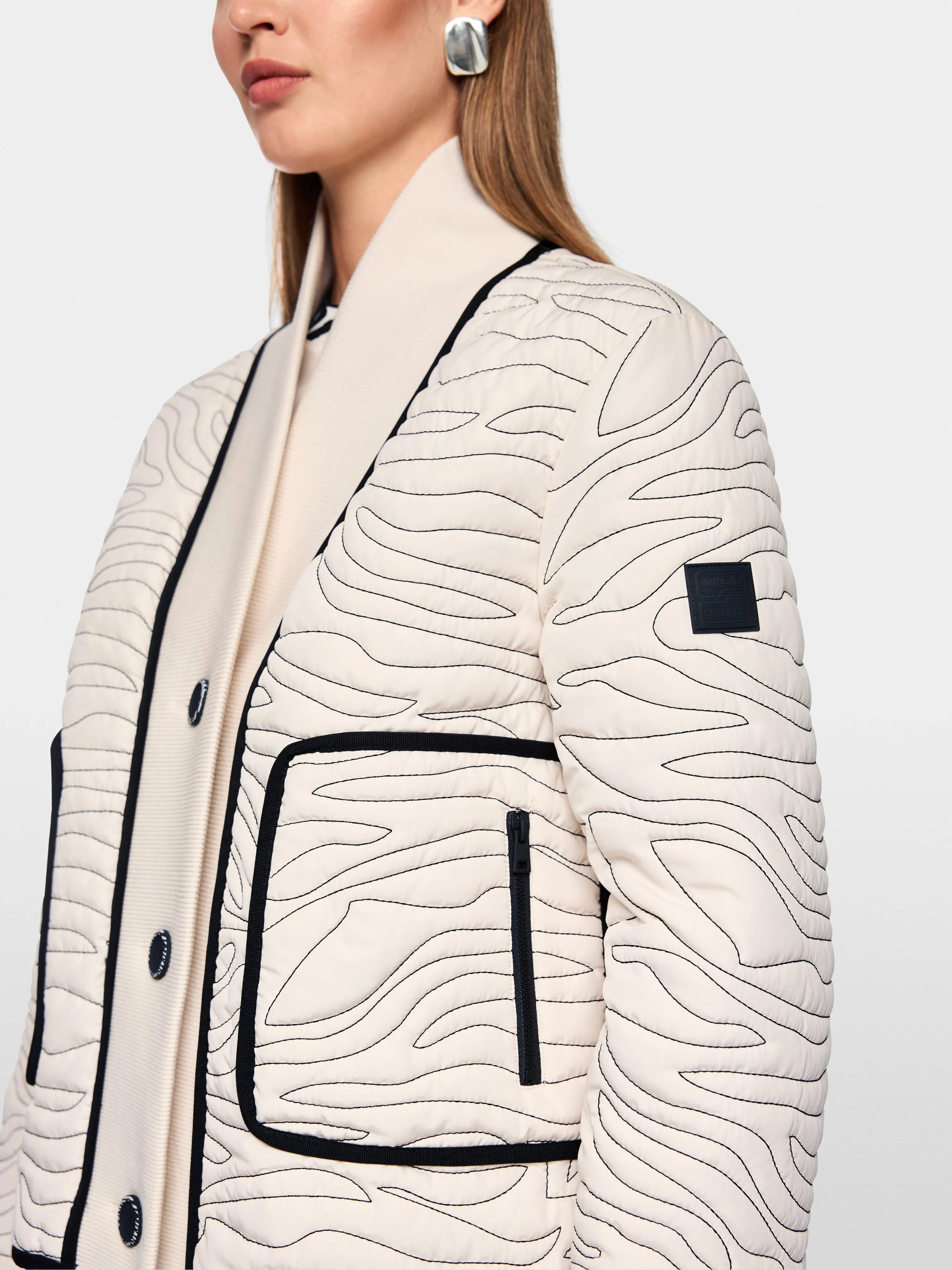 Marc Cain_Magnolia_Short Quilted Jacket with Knit Detail_AS 12.03 W18_153_03
