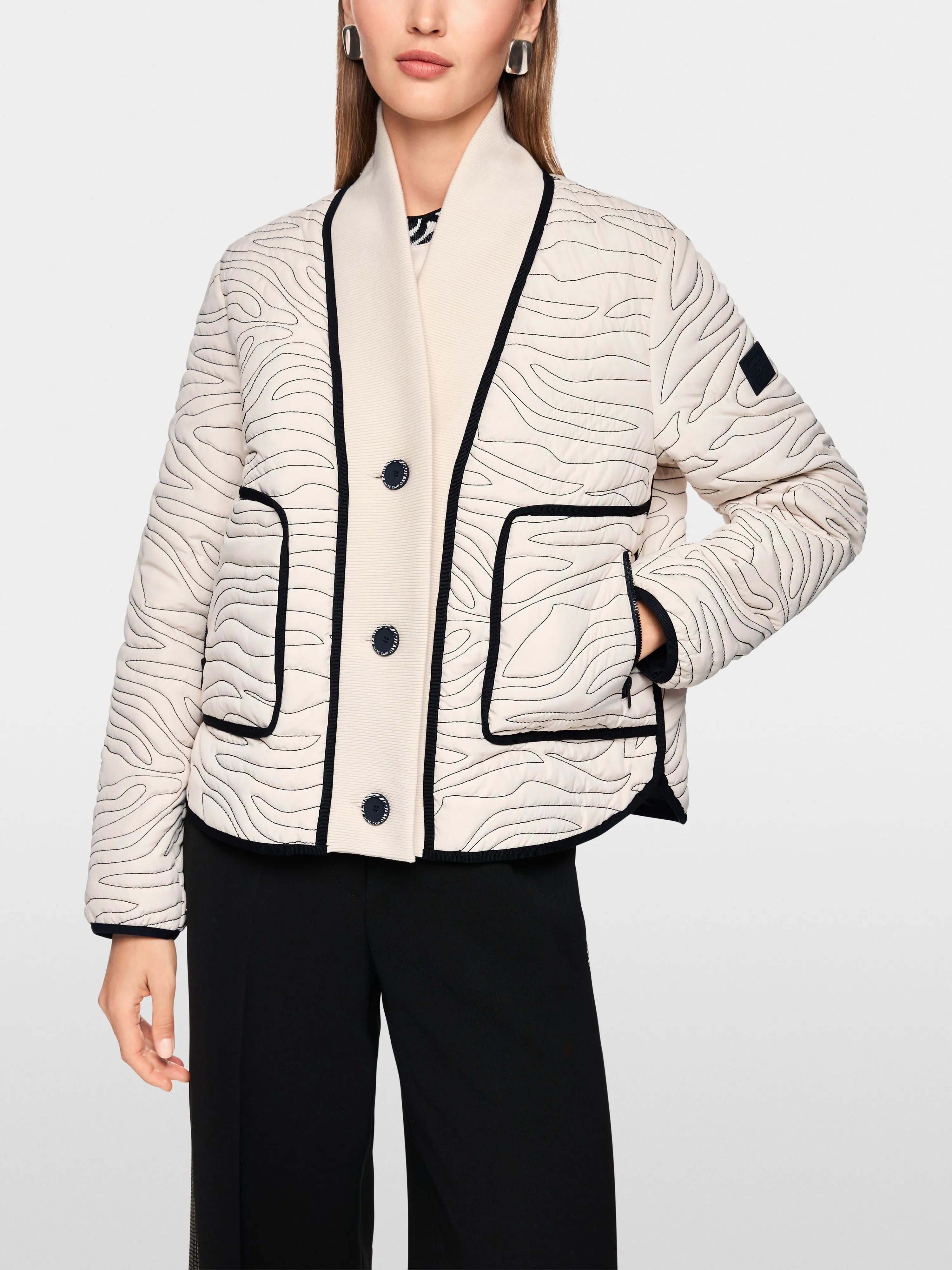 Marc Cain_Magnolia_Short Quilted Jacket with Knit Detail_AS 12.03 W18_153_05