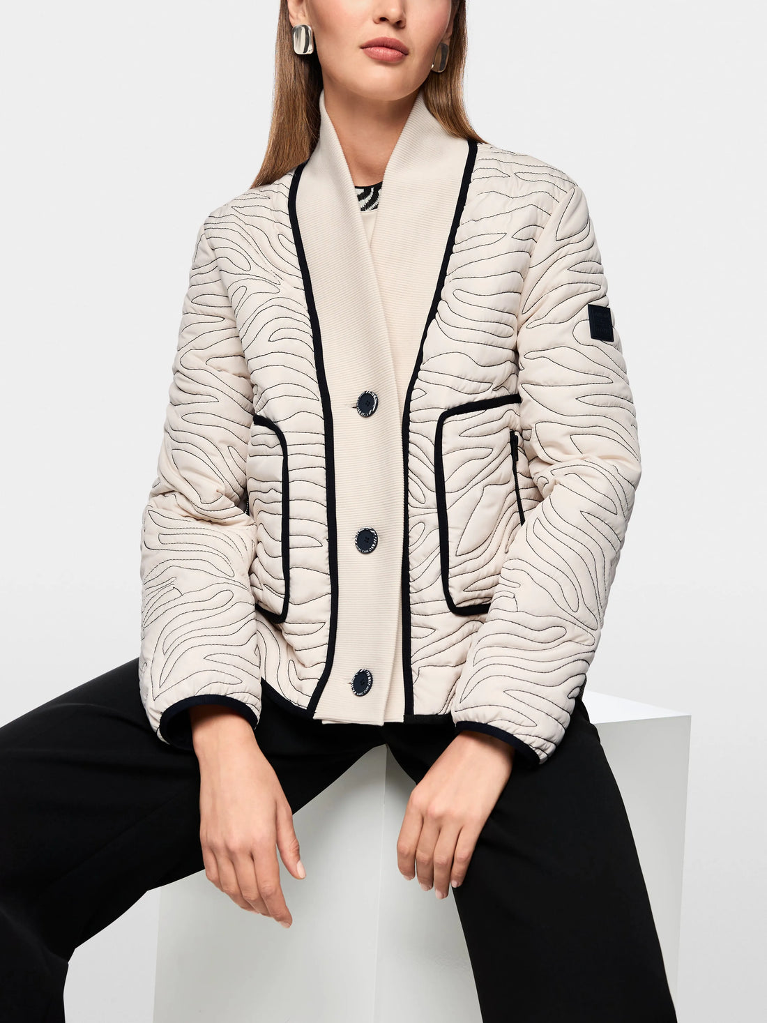 Marc Cain_Magnolia_Short Quilted Jacket with Knit Detail_AS 12.03 W18_153_06