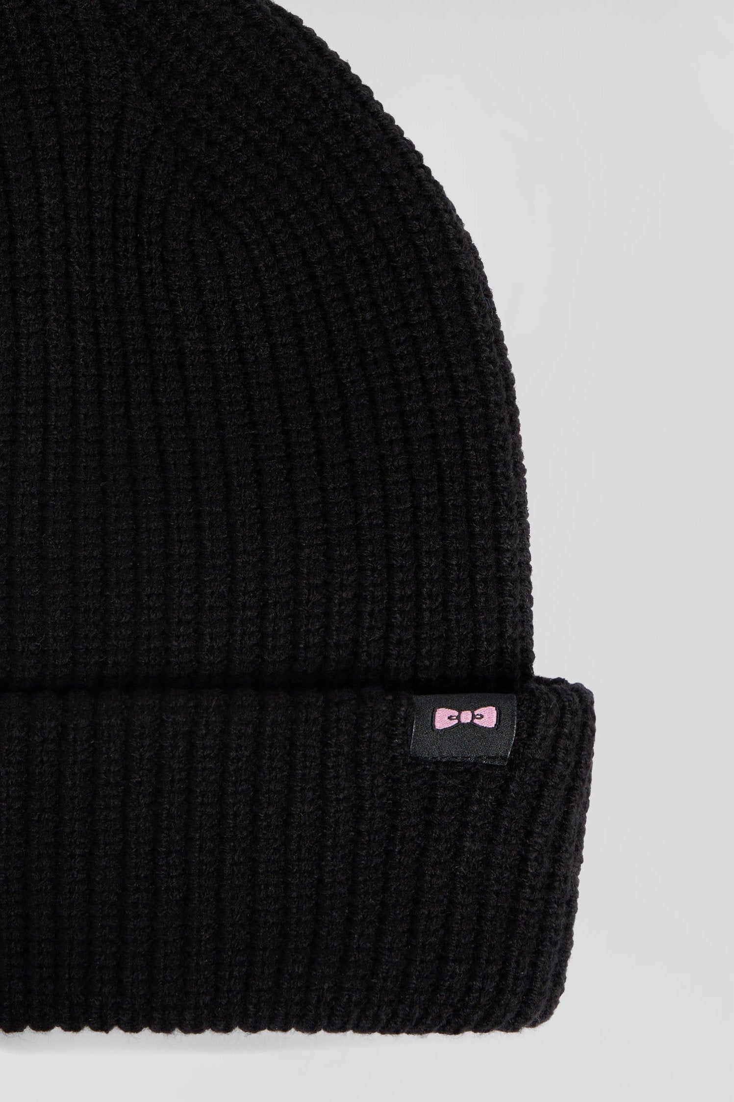 Black Knitted Beanie with Bow Tie Embroidery_H24CHABN0014_NO_04