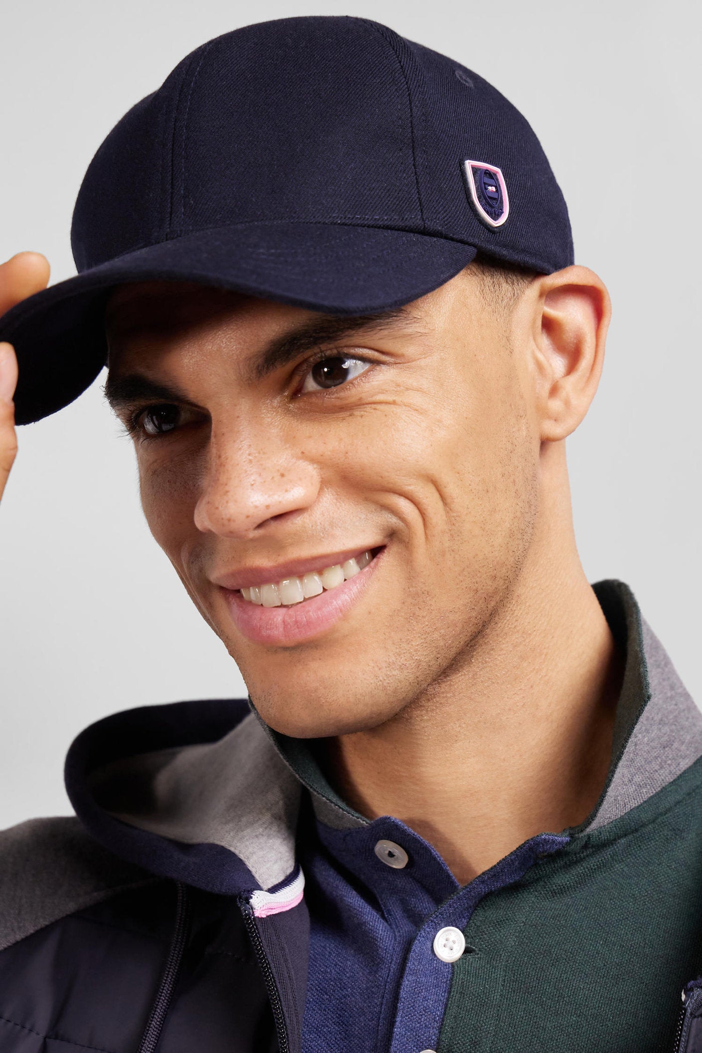 Navy Blue Cap With Rubber Badge And Tricolour Trim_01