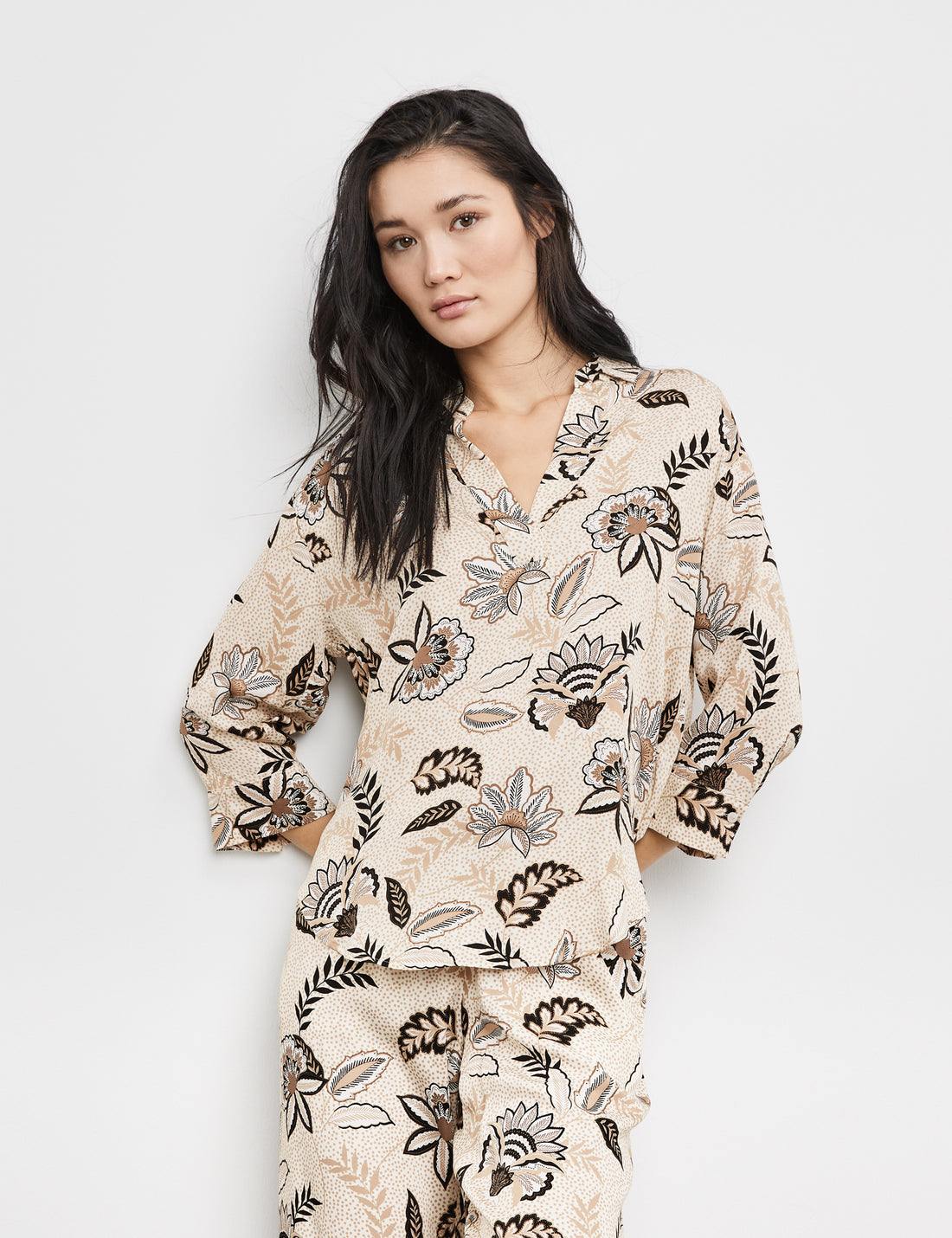 Tunic With A Floral Print