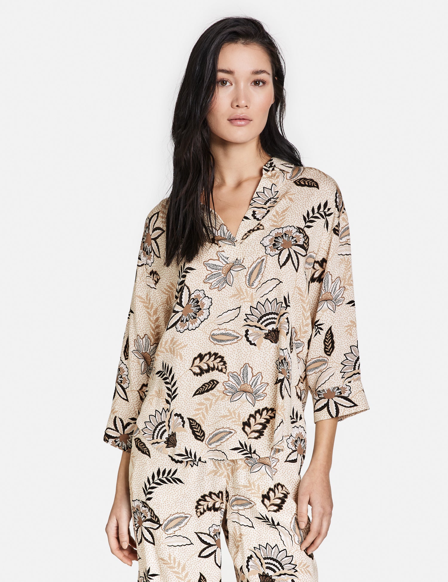 Tunic With A Floral Print