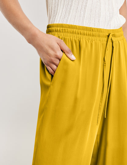 3/4-Length Palazzo Trousers With A Satin Finish