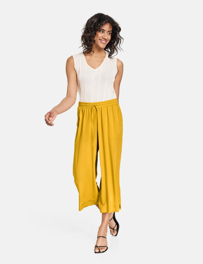 3/4-Length Palazzo Trousers With A Satin Finish