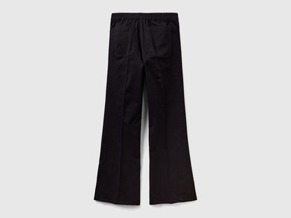 Flared Trousers With Slits