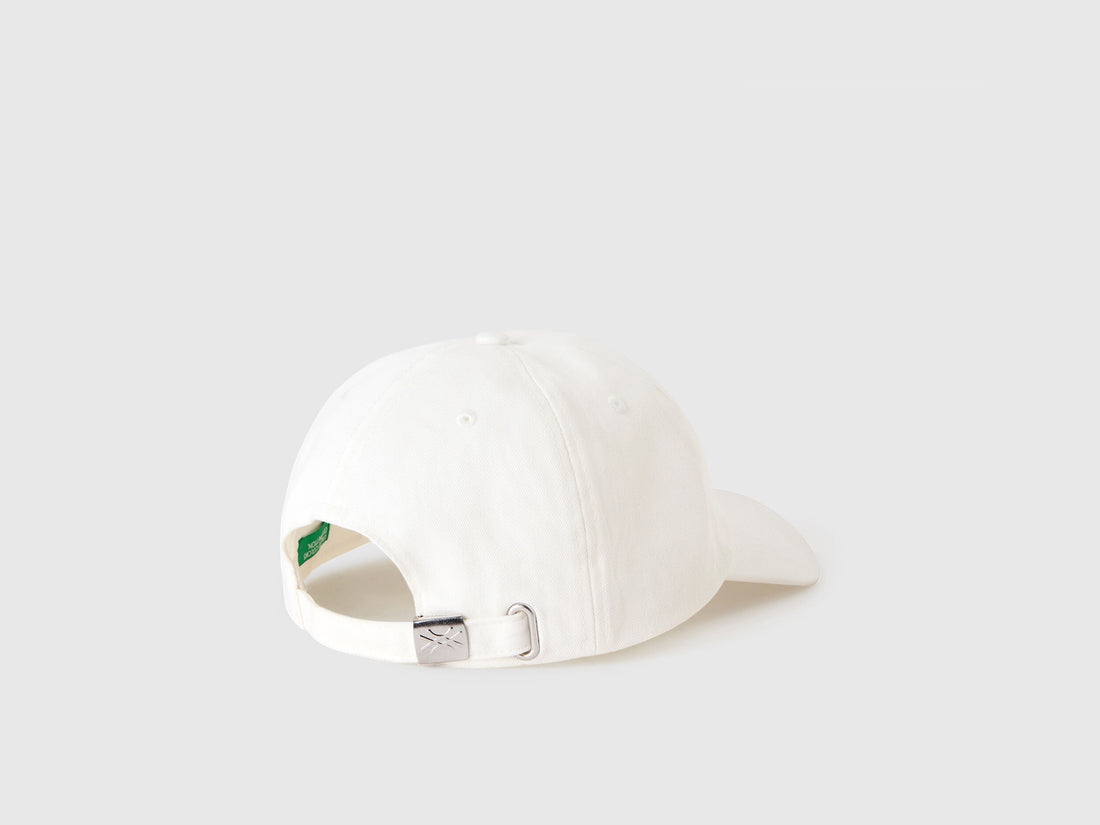 White Cap With Embroidered Logo