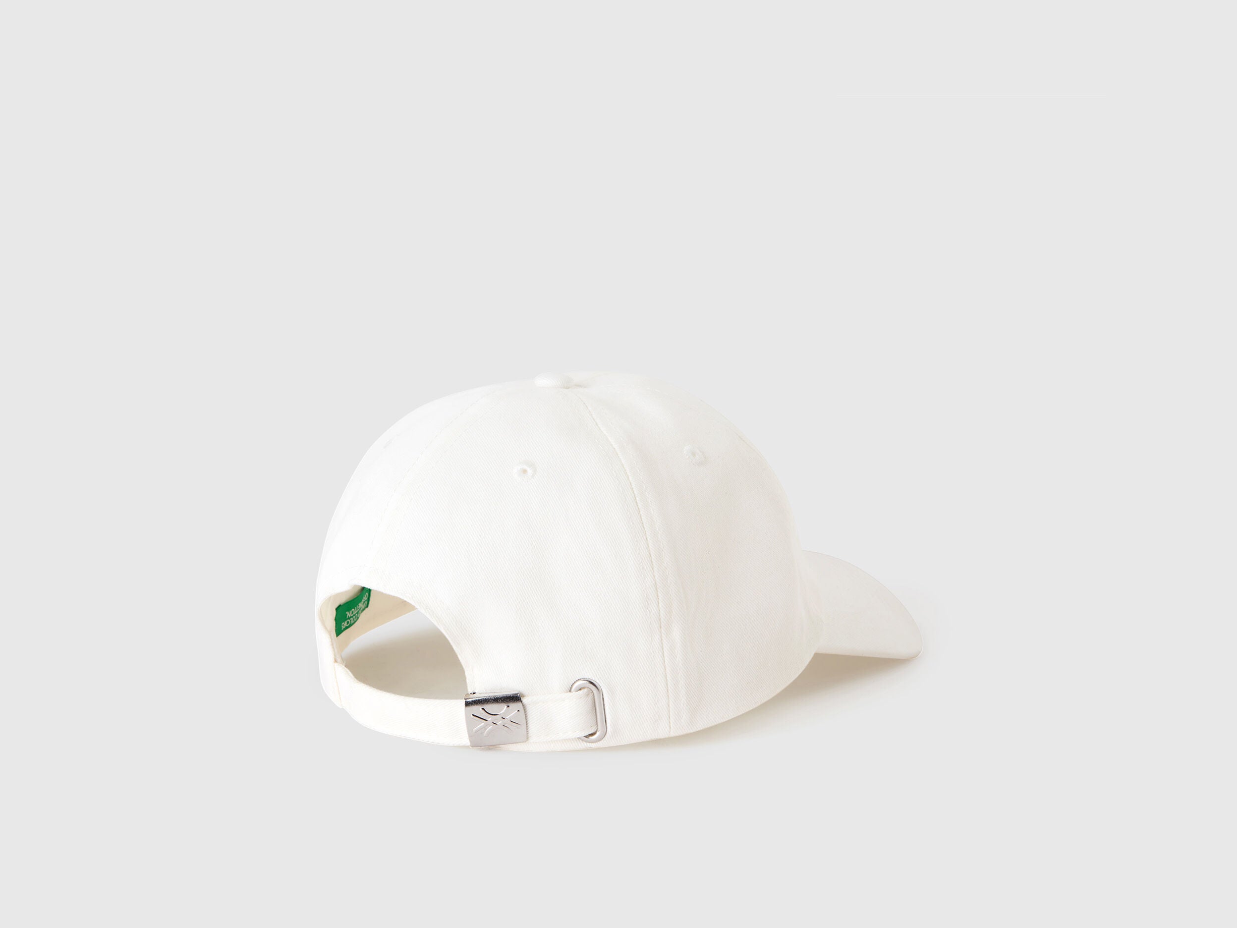 White Cap With Embroidered Logo