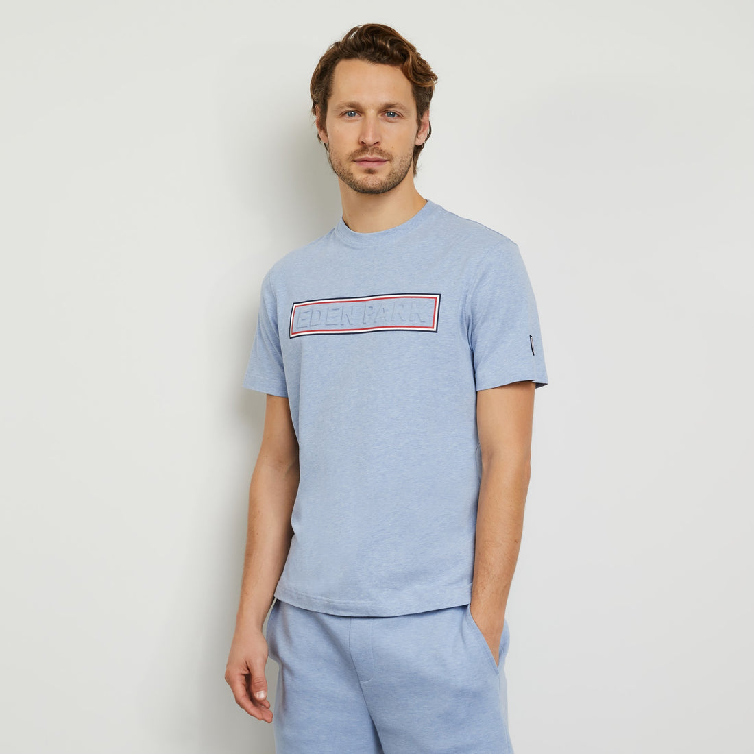 Light Blue T-Shirt With Embossed Inscription