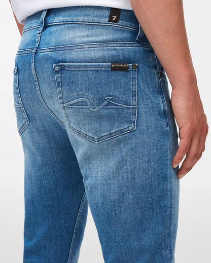 Light Blue Slimmy Tapered Stretch Tek Move Me 7 For All Mankind