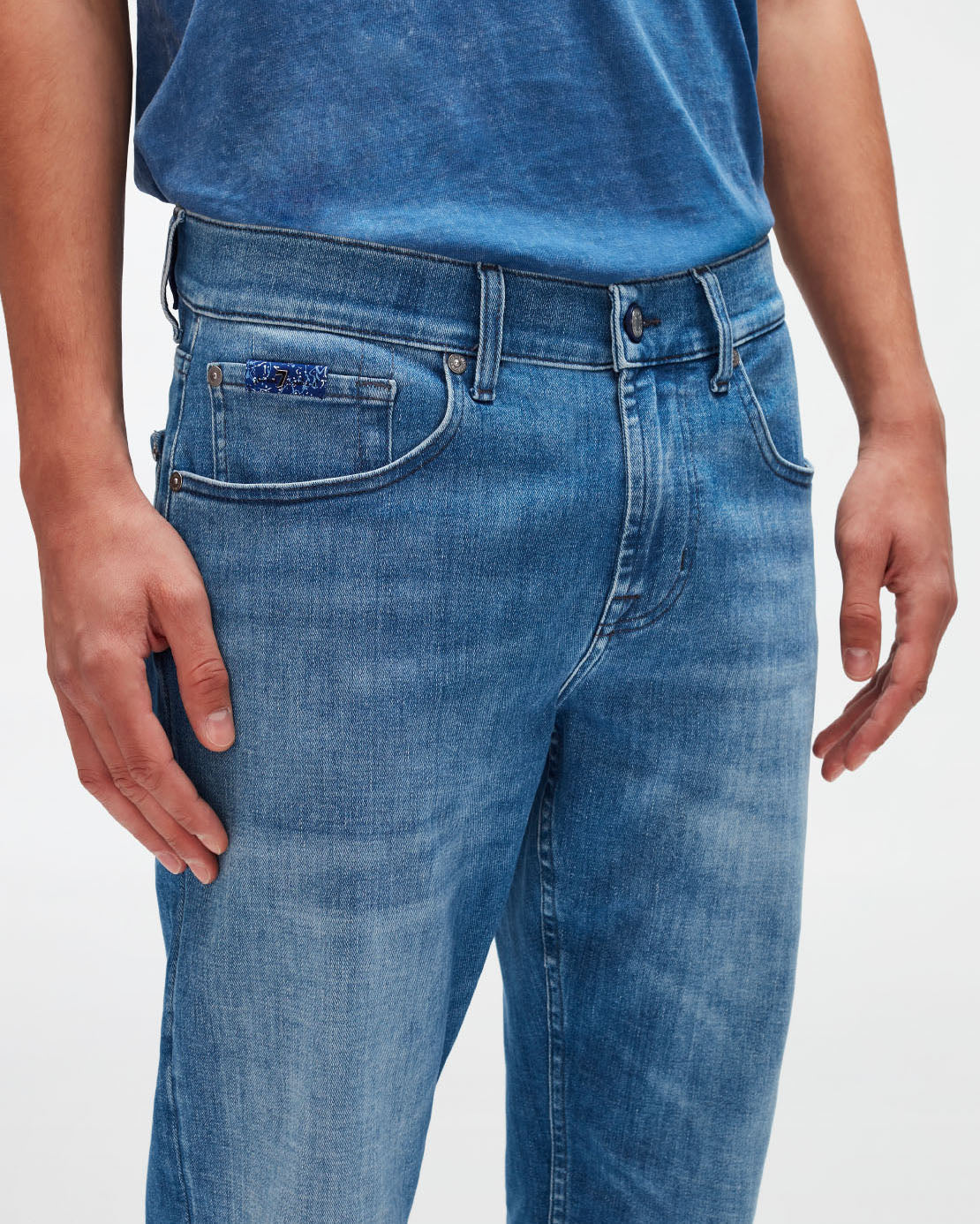 Light Blue Slimmy Tapered Special Edition Stretch Tek Move Me 7 For All Mankind