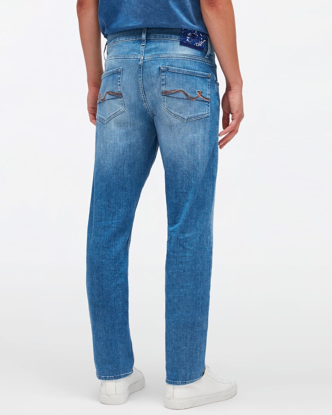 Light Blue Slimmy Tapered Special Edition Stretch Tek Move Me 7 For All Mankind