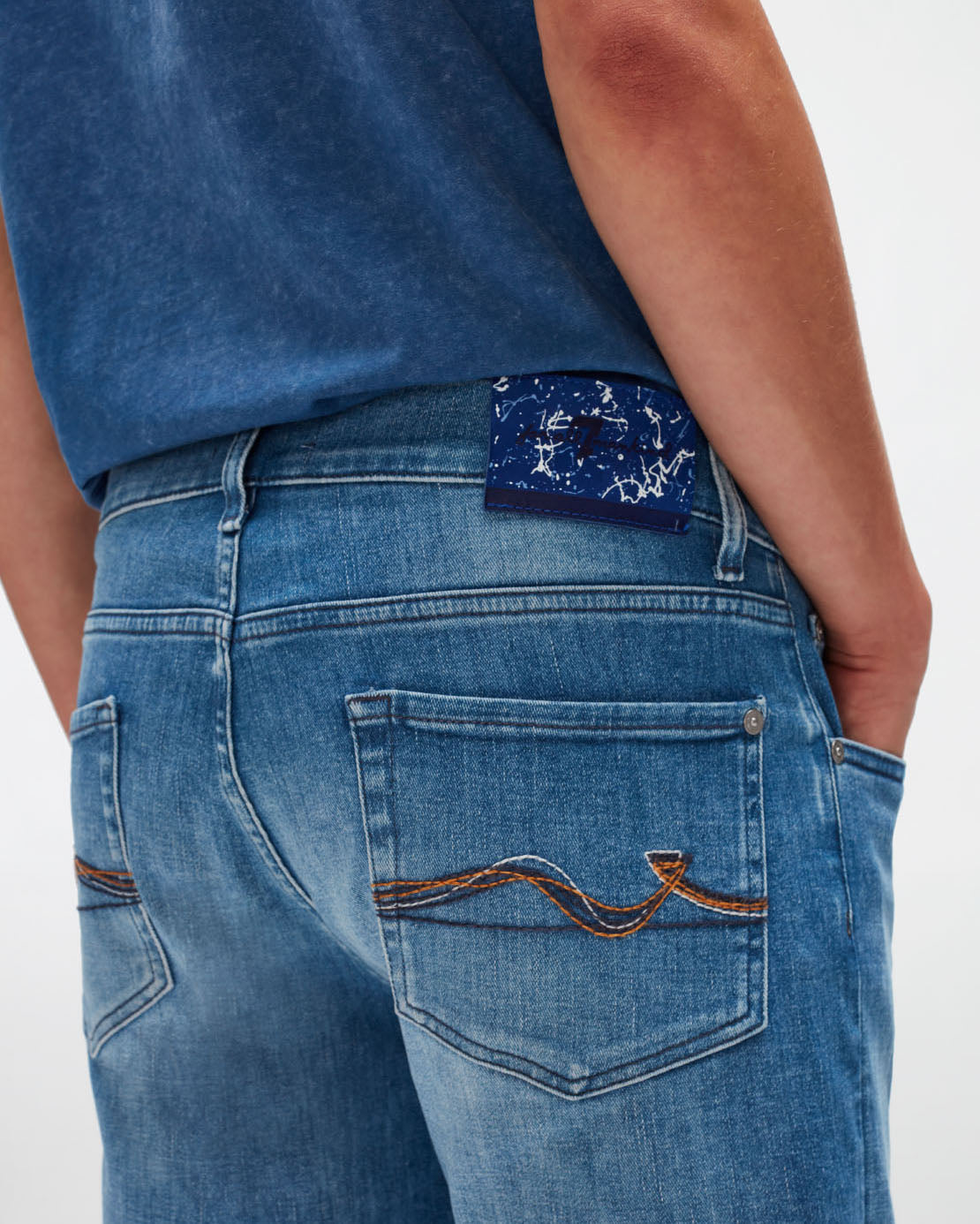 Light Blue Slimmy Tapered Special Edition Stretch Tek Move Me 7 For All Mankind