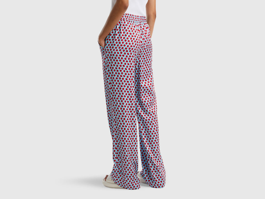 Light Blue Trousers With Apple Pattern
