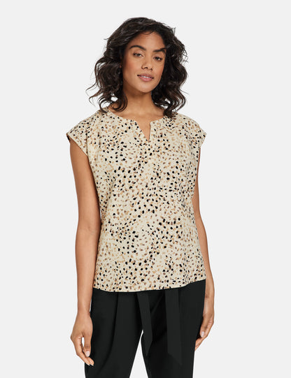 Sleeveless Blouse In A Linen Blend